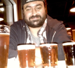 E-Rock has smiled over pints and samples of beer all year long, in between his various musical gigs.
