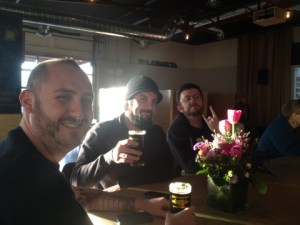 The Crew enjoys their first pints at Tractor's new Wells Park taproom. From left, Porter Pounder, Brandon, Stoutmeister. 