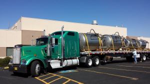 We borrowed this photo from Red Door's Facebook page showing their brewing tanks being delivered.