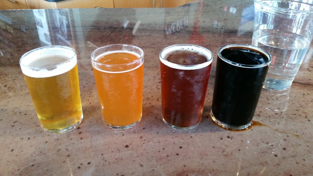 The first half of the flight, from left, Little Bird Blonde, Big House Belgo, Red Hammer, Black Point Stout.
