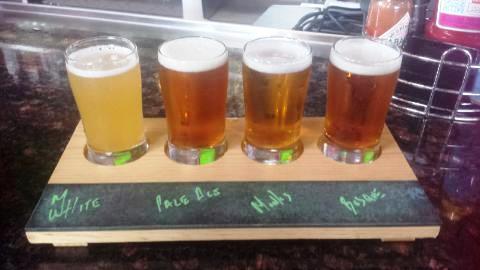 A flight of local beer is available at Rock & Brews.