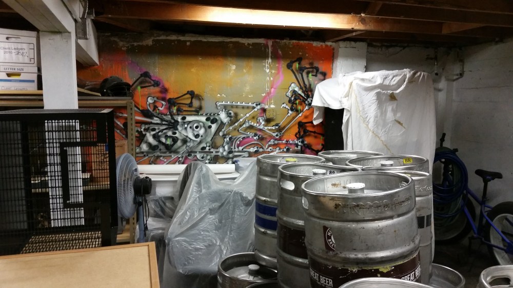 The basement still features some rather exceptional wall art from the previous owners of the building.