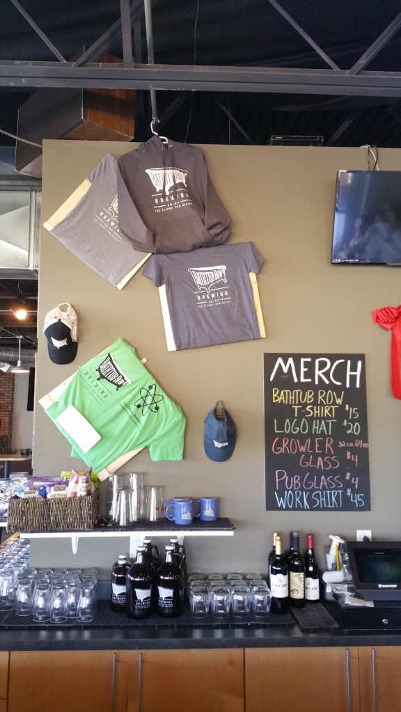 The new merch wall at the 'Tub.