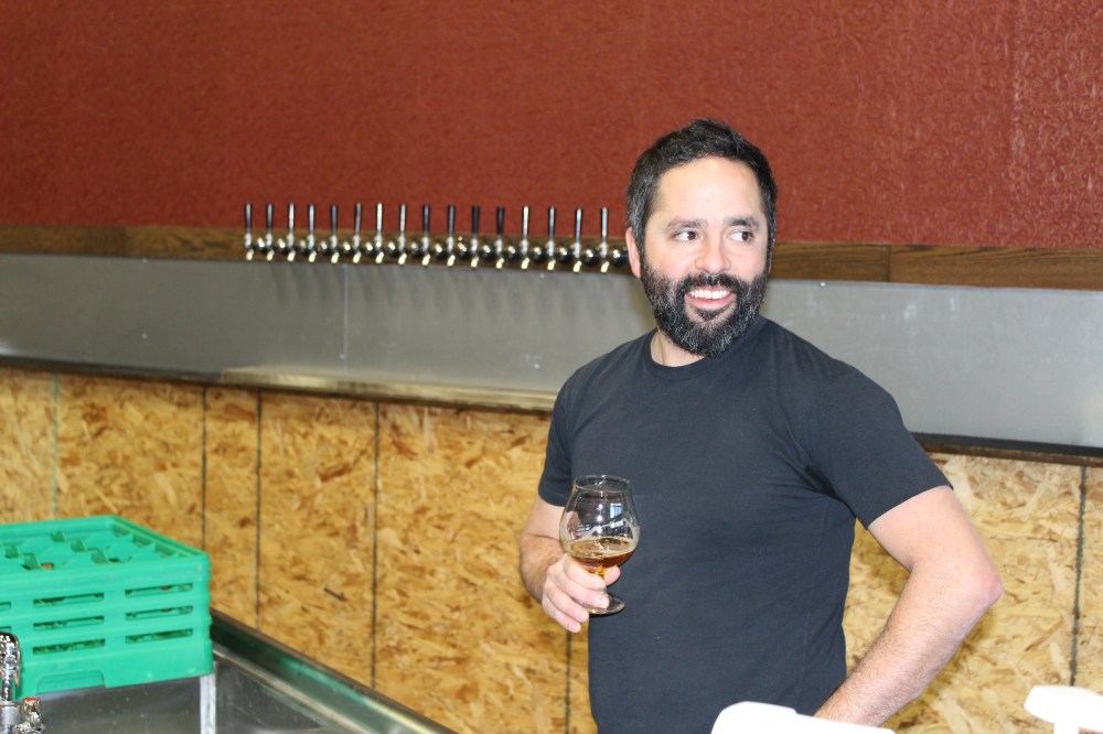 General manager Milo Carrejo hangs out behind the bar, which will feature 80 taps.