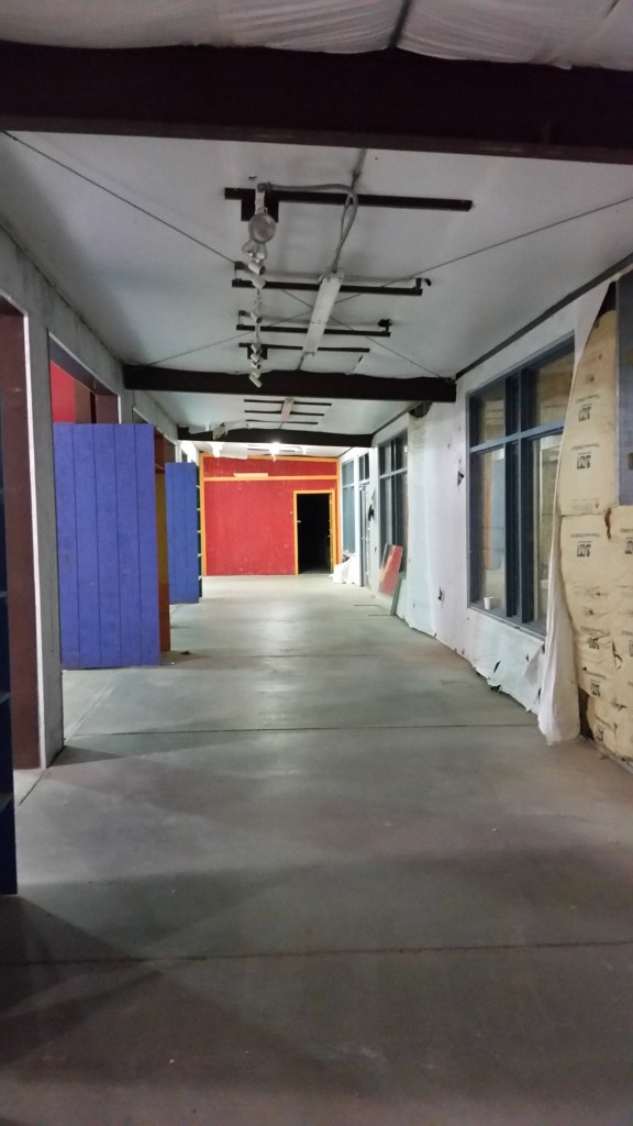 The packaging hall will run down here, but with higher ceilings and the outer wall pushed out to the right (east). 