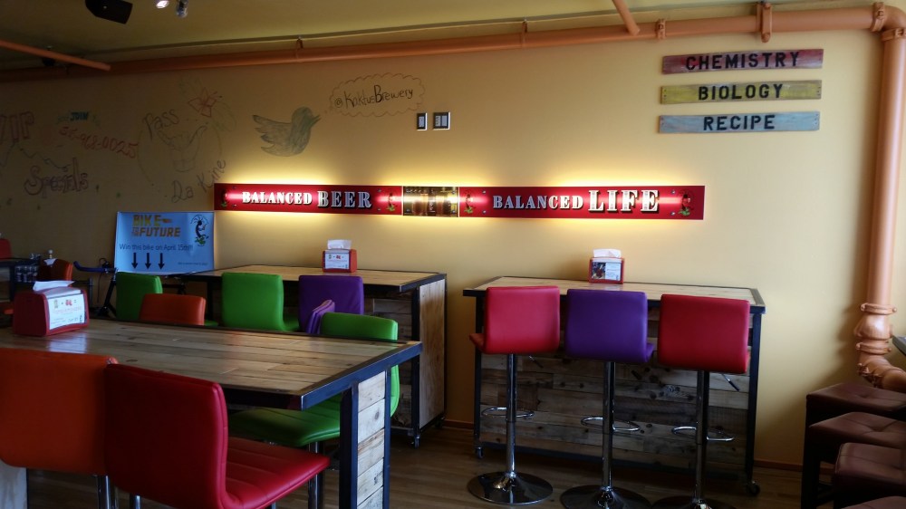 If you're gonna have an official slogan, make sure no one will miss it. 