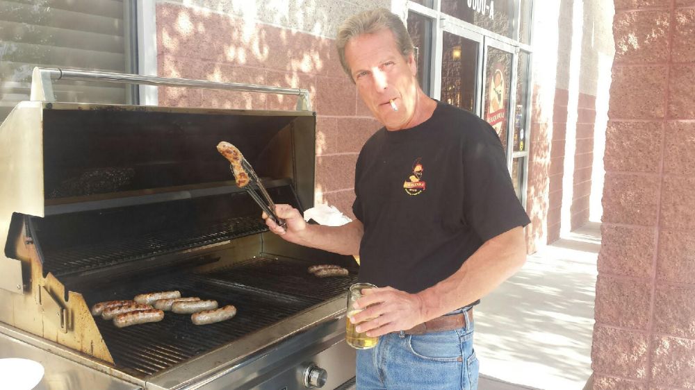 Albuquerque Brewing owner Curt Richter got the brats going after a bit of a delay.