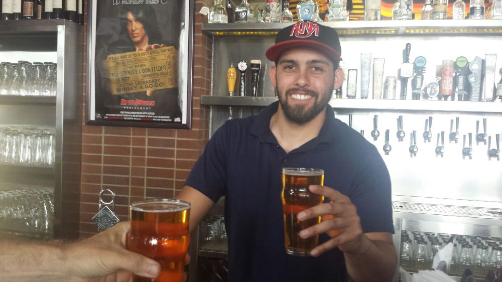 Bartender James was all smiles serving up Marble's Saison #1 at Rock & Brews.