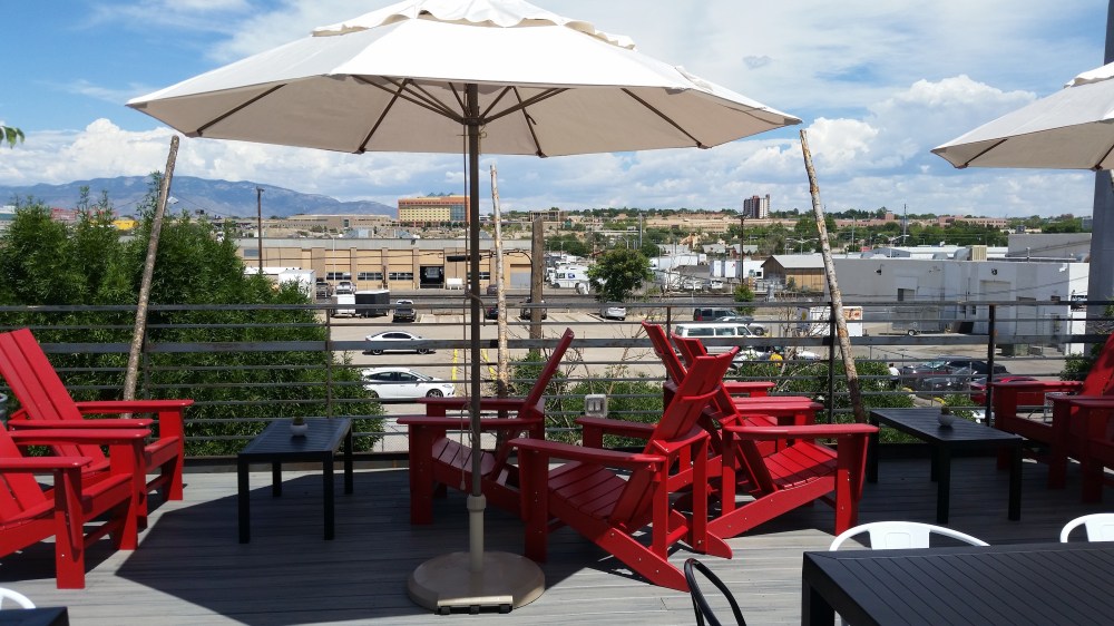 Looking east toward the Sandias, with the "lounge area" tables and chairs. 