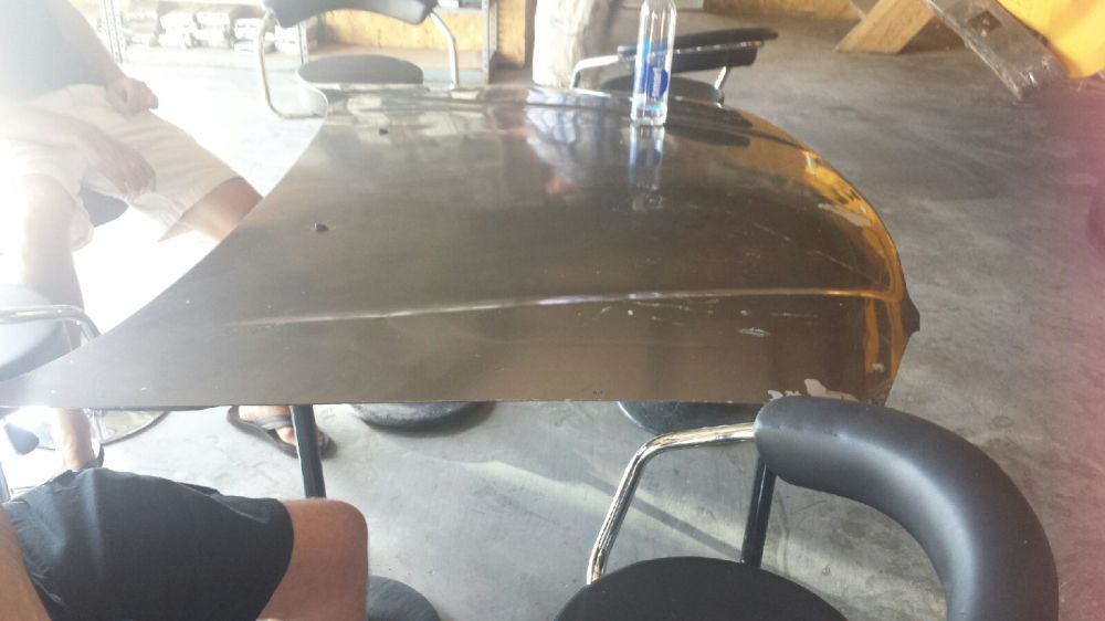 Car hoods for table tops? Why not?
