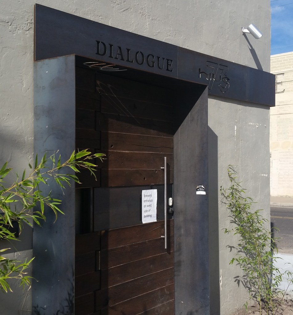 That's a cool sign above the door, even though the sign says don't enter through it (for now). 