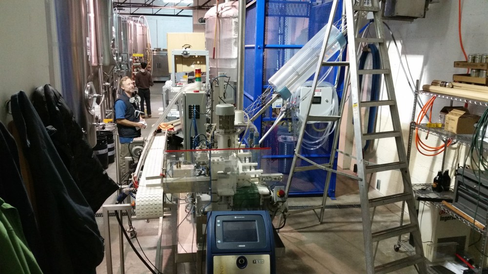 David is all smiles around his own canning line.