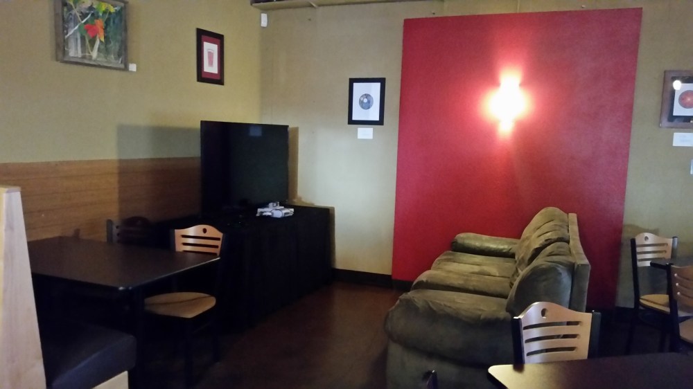 The ubiquitous TV and video game system at the main location. Tournaments may be coming back soon here and downtown!